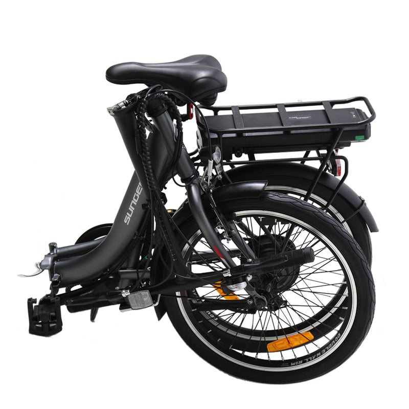 Txedbikes ECO Folding VII bicycle folded for compact storage, showing its lightweight frame and portable design.