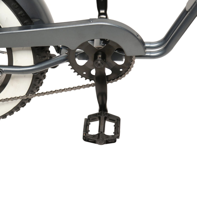 Times Tour JR by TXED, a sleek, modern electric bike with a silver frame and black accents, ready for urban commuting.